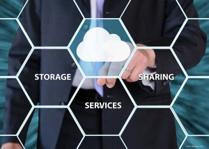 man in suit behind honey comb of cloud services